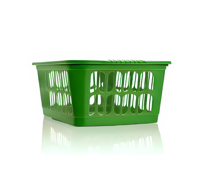 Green plastic basket on a white background